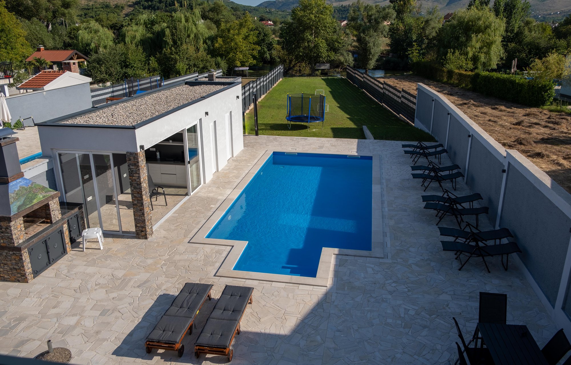 Aerial view of Villa Verona with a private pool, summer kitchen and riverside garden in Blagaj, near Mostar