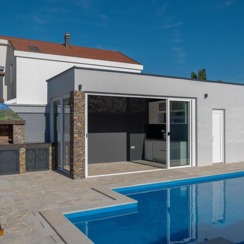 Summer kitchen and BBQ area beside the pool at Villa Verona, Blagaj