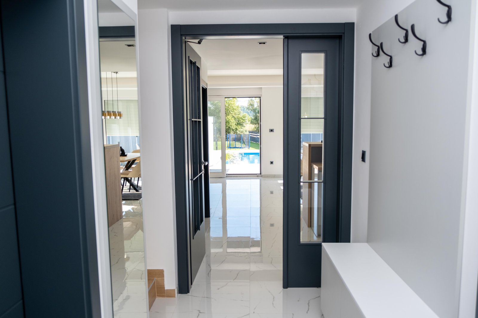 Bright entrance hallway with a view of the private pool at Villa Verona near Mostar