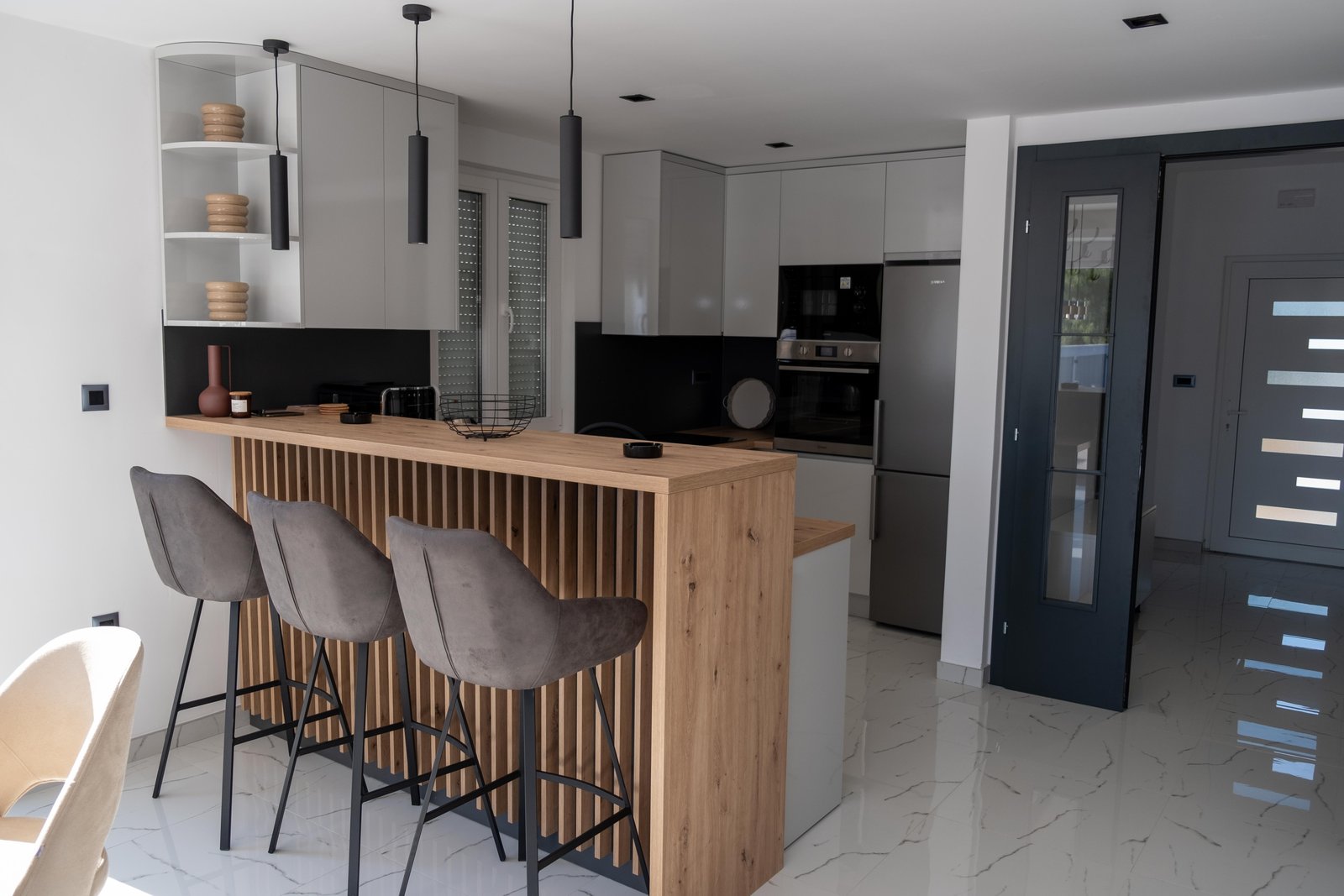 Modern fully equipped kitchen with island bar at Villa Verona near Mostar